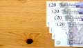 Row of British twenty pound notes on a table Royalty Free Stock Photo