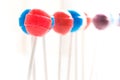 Staggering row of lollipops fading into background Royalty Free Stock Photo