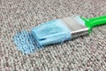 Stained carpet with paint brush Royalty Free Stock Photo
