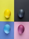 Stained Easter eggs as an attribute of Easter celebration on colorful background