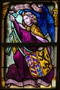 Stained Glass, Angel holding a Coat of Arms Royalty Free Stock Photo