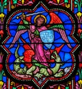 Stained Glass - the Archangel Michael vanquishing Satan Royalty Free Stock Photo