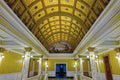 Pierre, South Dakota, USA - July 27, 2014: Stained glass arched skylight and mural above the main staircase at the State Capitol