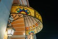 Stained glass awning at the historic Gran Hotel de Merida lit up at night