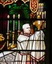 Stained Glass - a bishop holding a Monstrance Royalty Free Stock Photo