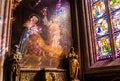 Stained glass and canvas in the chapel of Cathedrale Saint-Corentin de Quimper. This is the is the seat of the Bishops of Quimper- Royalty Free Stock Photo