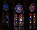 Stained Glass in Notre Dame, Paris - Jesus, Mary and Saints Royalty Free Stock Photo
