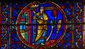 Stained Glass in Notre Dame, Paris depicting Theospita Royalty Free Stock Photo