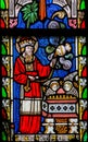 Stained Glass window depicting the Bible Verse Leviticus 7:35 Royalty Free Stock Photo