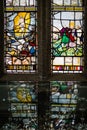 Stained glass church window depicting Saints