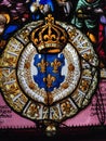 Stained glass coat of arms of nobleman with lily Fleur de lis