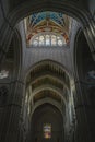 the stained glass is in the middle of this church navel