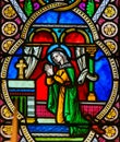 Stained Glass in Monaco Cathedral - Mother Mary in Prayer Royalty Free Stock Photo
