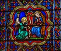 Stained Glass in Notre Dame, Annunciation with Mother Mary and the Archangel Gabriel Royalty Free Stock Photo