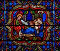 Stained Glass in Notre Dame, Parisof a Nativity Scene at Christmas Royalty Free Stock Photo