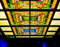 Stained glass skylight ceiling in hallway of vintage building