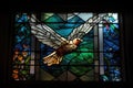 stained glass window, with a bird in flight, bringing light and color to the space Royalty Free Stock Photo