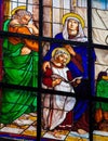 Stained glass window of the Child Jesus and Mary and Joseph Royalty Free Stock Photo