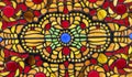 Stained glass window with colorful oriental ornament