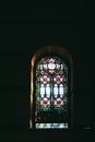 Stained glass window with colorful patterns in a church Royalty Free Stock Photo