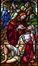 Stained Glass Window Depicting the Good Samaritan in Roxton Chapel.