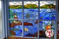 Stained glass window depicting marine environment