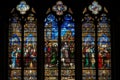 stained glass window, depicting a religious scene, in medieval cathedral Royalty Free Stock Photo