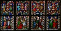 Stained glass window depicting scenes in the life of Mother Mary Royalty Free Stock Photo