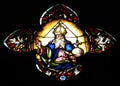 Stained glass window detail with Biblical scene