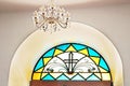 Stained glass window detail with cross, Dir Rafat monastery Royalty Free Stock Photo