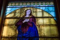 Stained Glass Window inside Italian Church depicting Virgin Mary