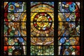 stained glass window with mosaic of intricate shapes and colors