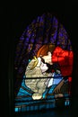 Stained glass window with the prince`s kiss to Sleeping Beauty. Disney movie. Sleeping Beauty Story. Princess Castle at Euro Disne