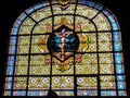 Stained glass window in Saint-Sulpice church in Paris Royalty Free Stock Photo