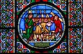 Stained glass window showing the building of Noahs Ark