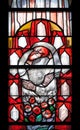 Stained glass window in Chapel at cemetery in Ursberg, Germany Royalty Free Stock Photo