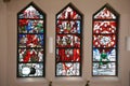 Stained glass window in St. John church in Piflas, Germany