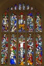 Stained Glass Window in St Neots Church East Wall depicting the Crucifixion and the Kingship of Christ.