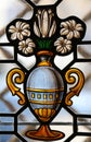 Stained Glass window of a vase with white flowers in the Cathedr Royalty Free Stock Photo