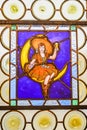 Stained Glass Window Woman Sitting on Moon Drinking Beer Royalty Free Stock Photo