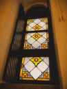 Stained glass windows, beautifully shimmering light through a different color glass