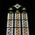 Stained glass windows of St. Vitus in Prague, Czech Republic.