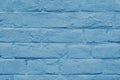 Stained old stucco blue painted brick wall background, aged masonry texture Royalty Free Stock Photo