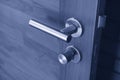 Stainless or Aluminum steel modern door handle on wooden door,Handle and keyhole detail Door lock,Interior door knob in bedroom