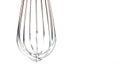 stainless balloon whisk isolated in white background Royalty Free Stock Photo