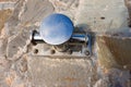 Stainless Boat Bollard on Stone Pier Royalty Free Stock Photo