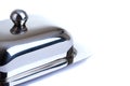 Stainless butterdish on a white background Royalty Free Stock Photo