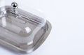 Stainless butterdish on a white background Royalty Free Stock Photo