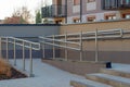 Stainless handrail by modern apartment building Royalty Free Stock Photo