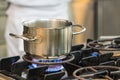 Stainless pot cooking Royalty Free Stock Photo